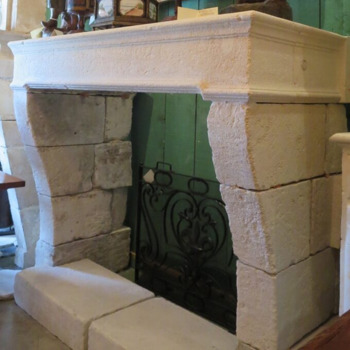 Louis XIV Style Carved Limestone Fireplace